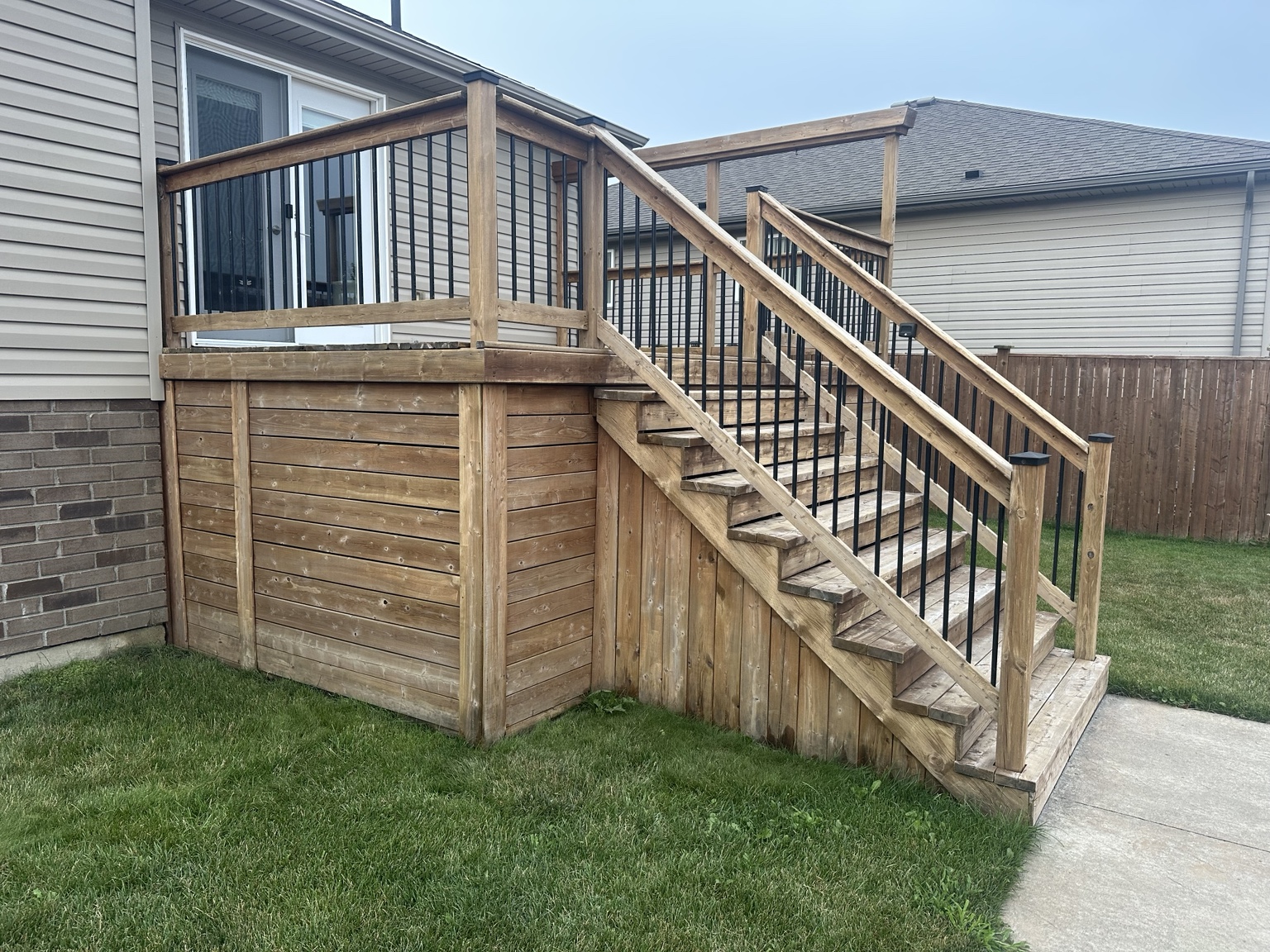Weathered deck before charcoal staining