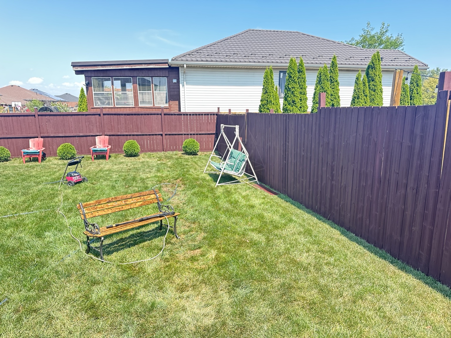 Professionally stained backyard fence