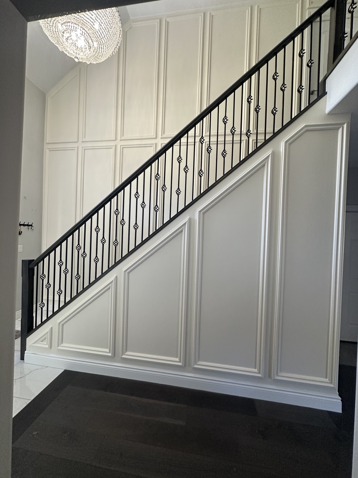 White staircase wainscoting