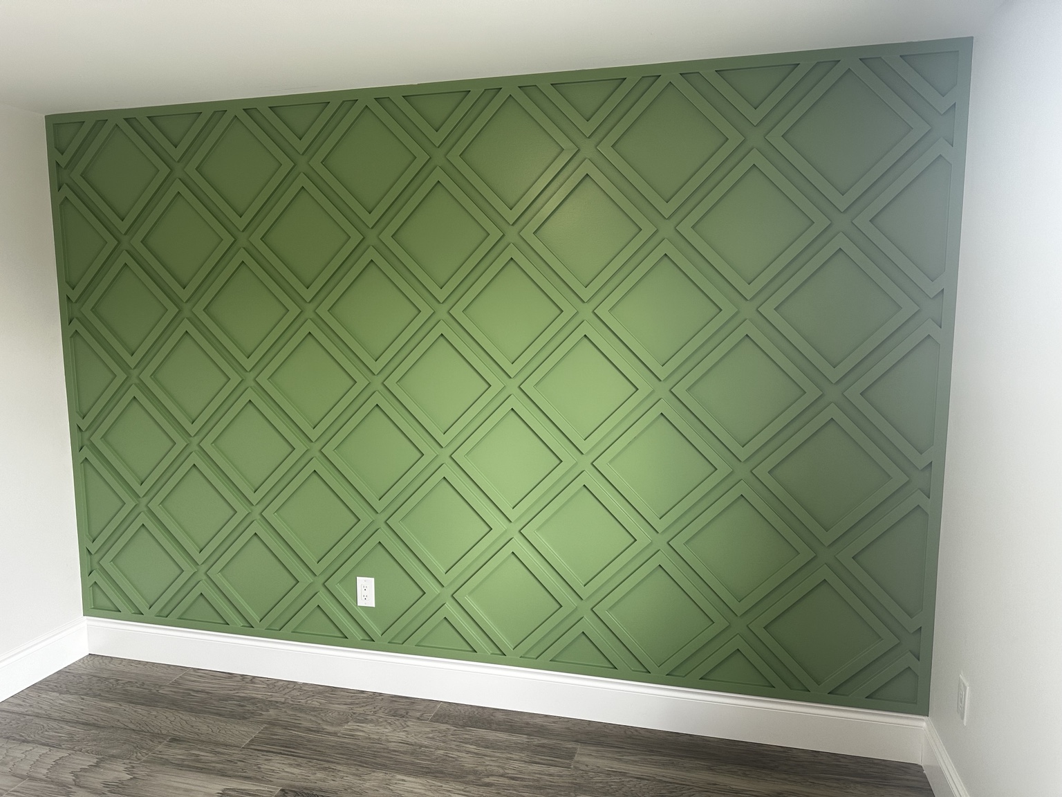 Green geometric feature wall
