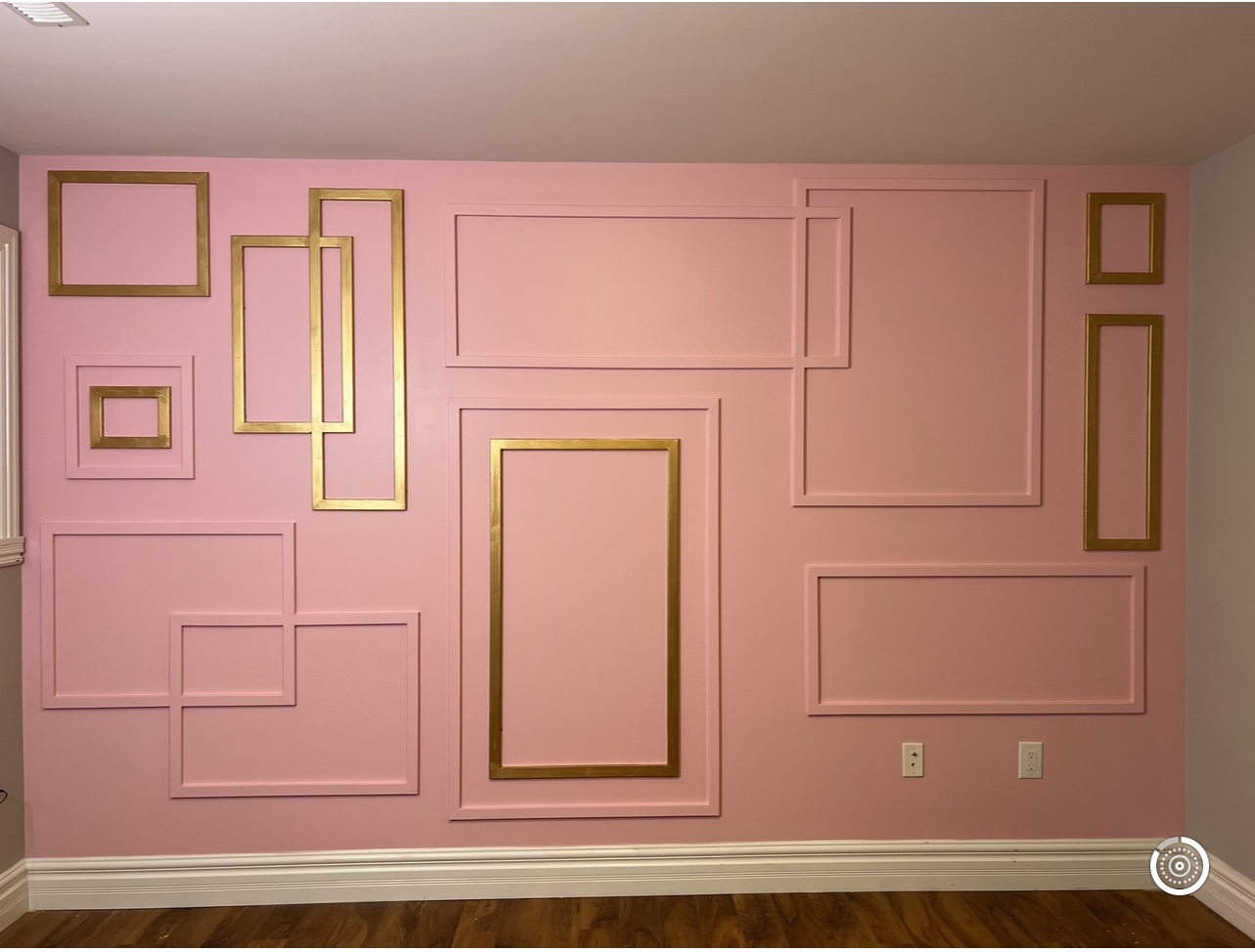 Pink picture-frame moulding with gold accents